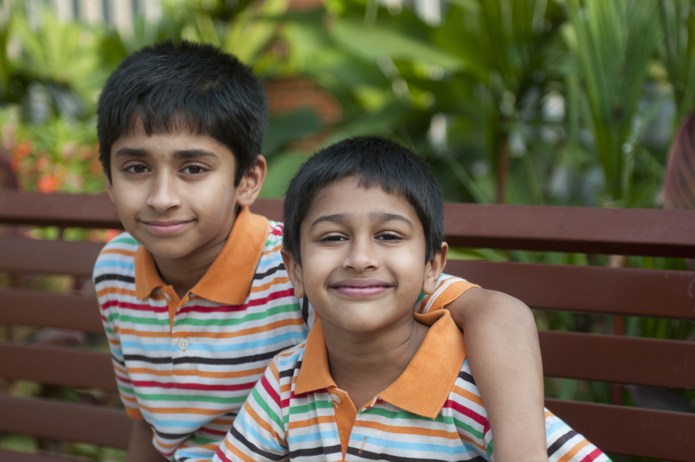 photo of two young boys recently immigrated to Canada